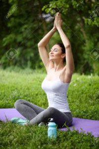Calm woman relaxing in park